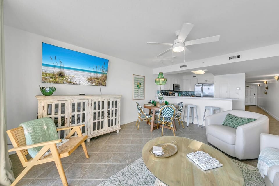 Your coastal retreat features an open living space with beach-inspired décor and modern amenities for relaxing vacation moments.