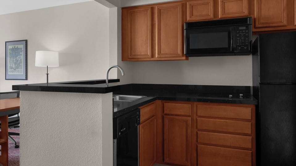 Cook easy meals in the kitchenette with full-size fridge.