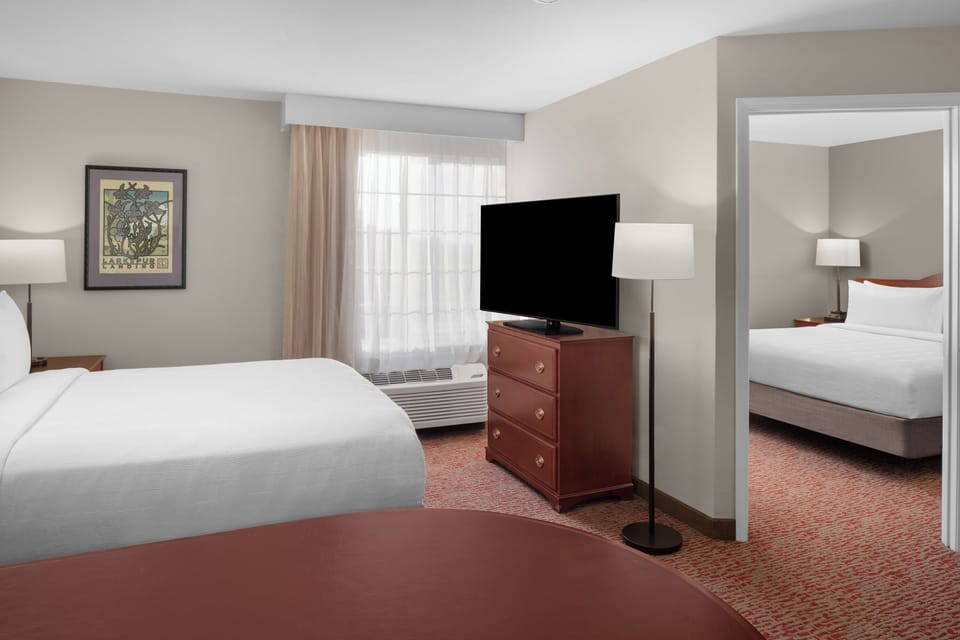 Settle in with a separate sleeping area and big-screen TV.