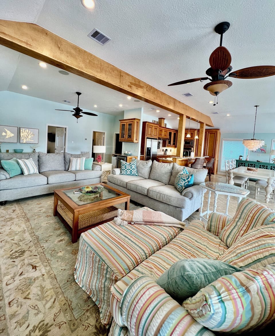 Open concept kitchen, dining and living room.