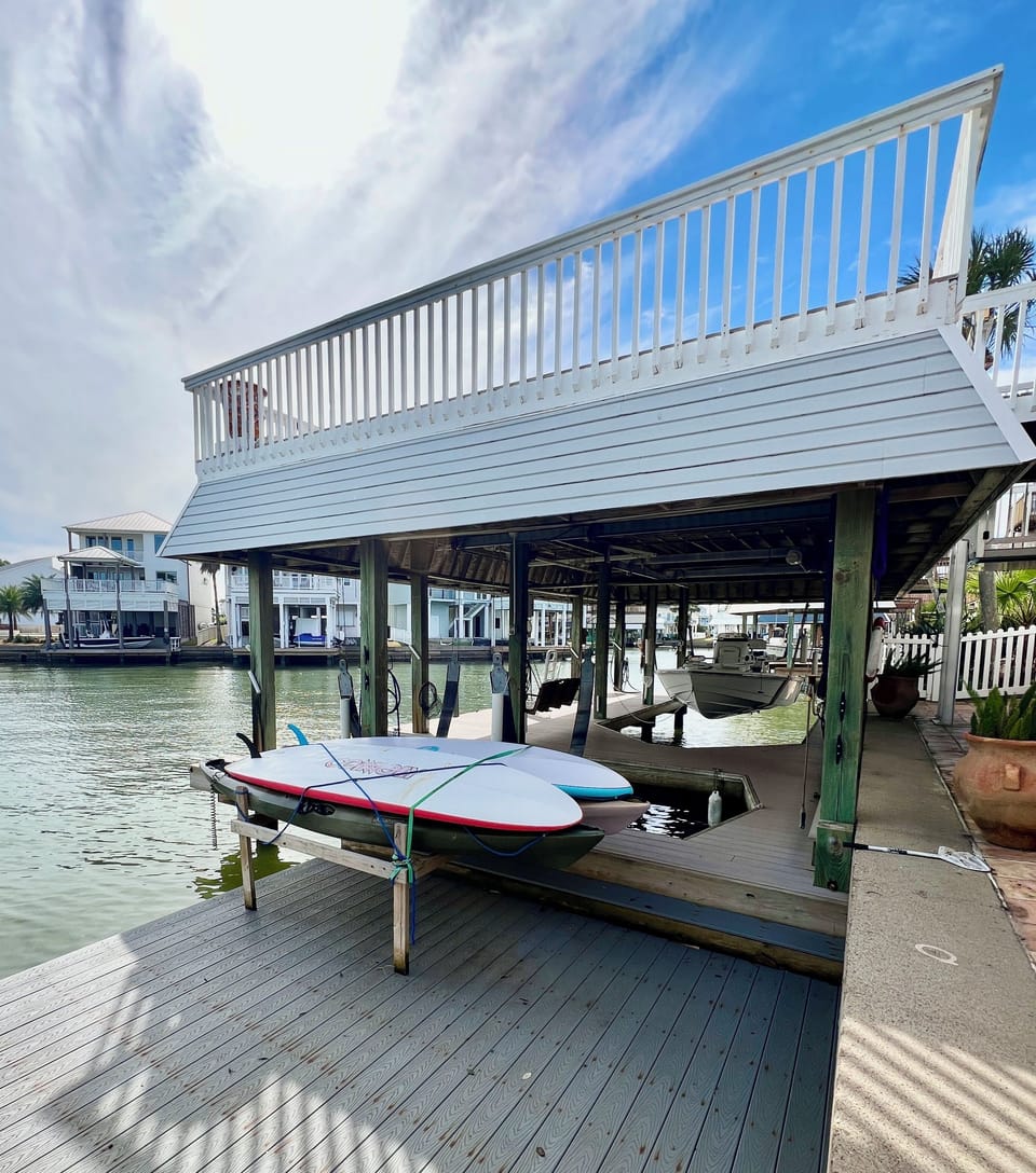 Lower level dock makes it easy to launch paddleboards and kayaks. 