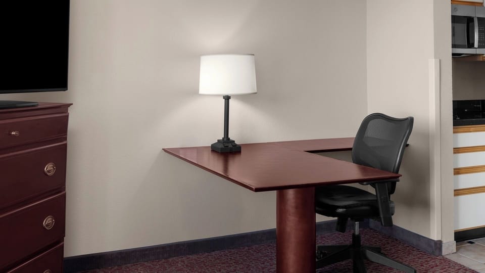 Get focused at the roomy desk with comfortable task seating.
