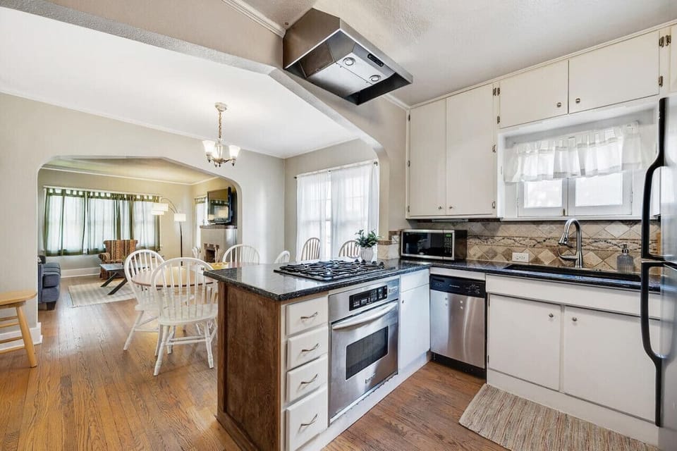 Plenty of counter space for meal prep with a bright dining space.