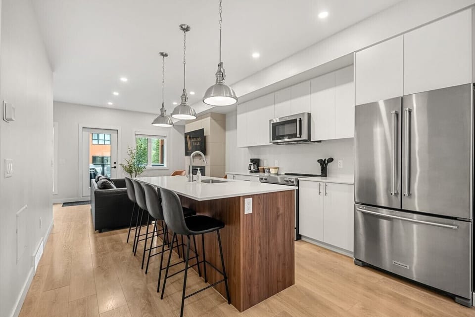Full kitchen with a blender, griddle, slow cooker, drip coffee machine, ground coffee, tea, sugar and basic condiments (ketchup, mustard and relish.)