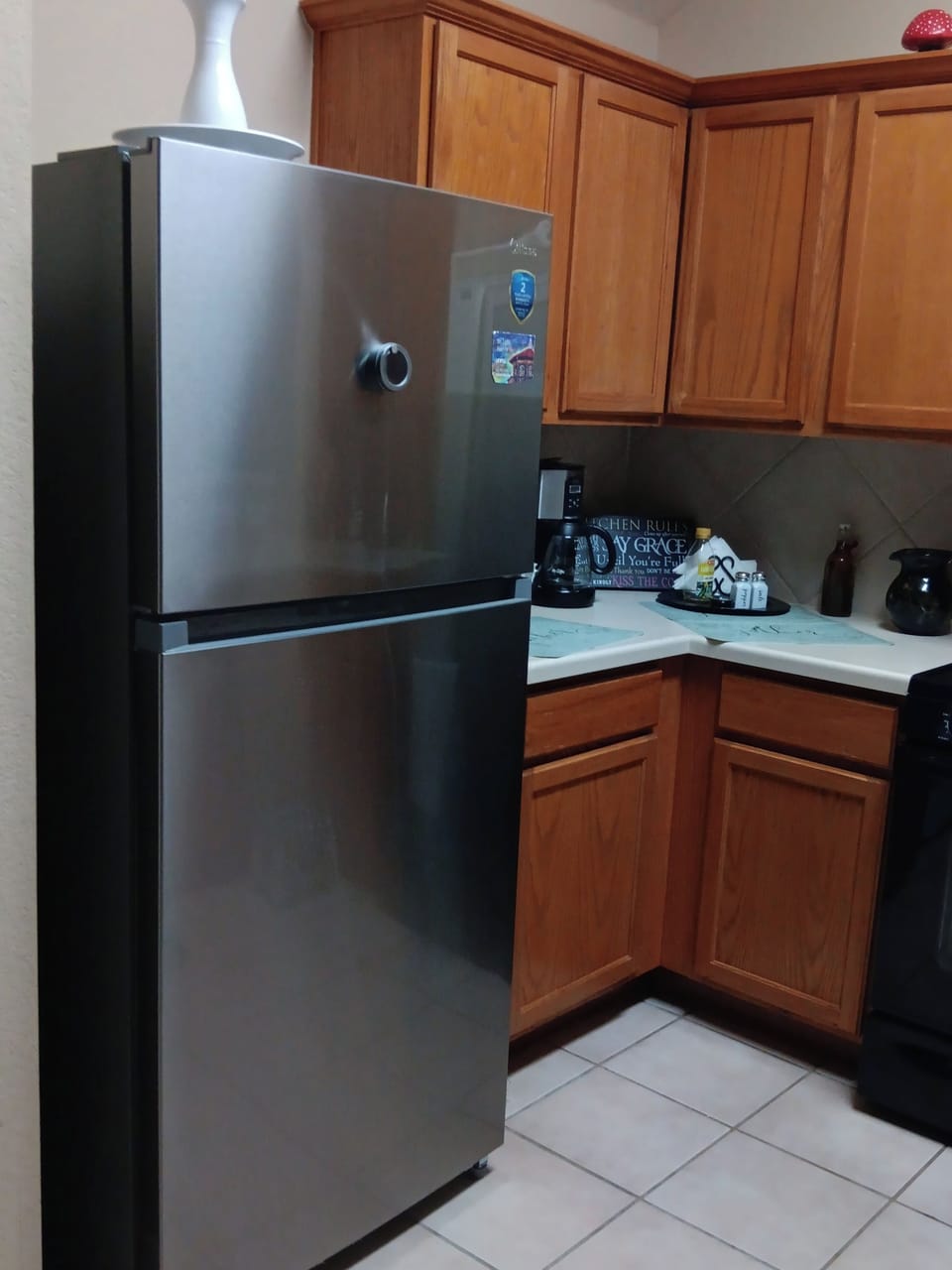 View of kitchen with new silver appliances