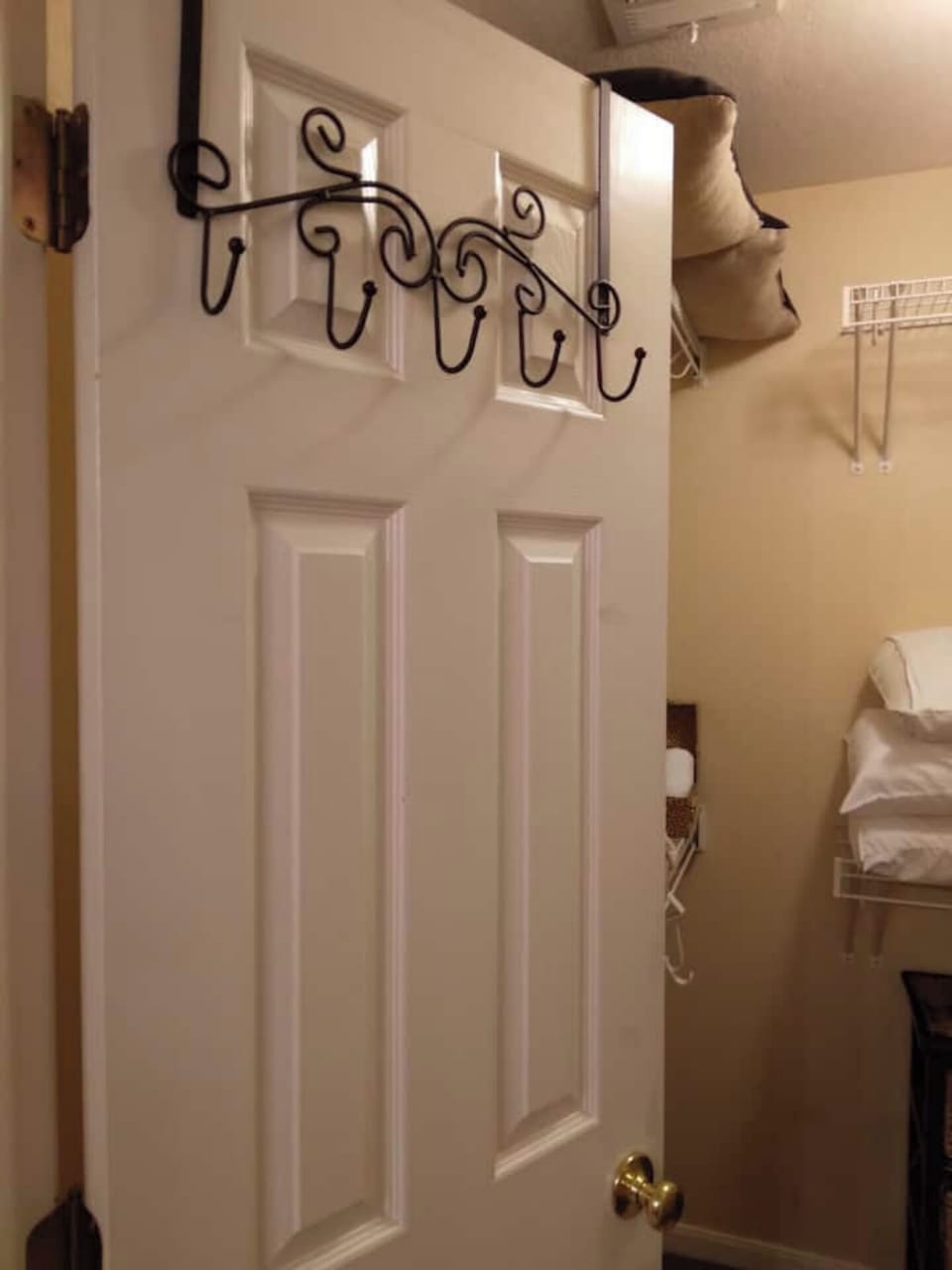 Both Bathrm Doors have Hanging Racks for extra Towels