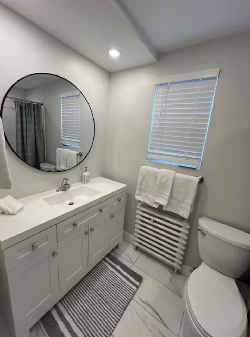 Full bathroom with bathtub/shower.