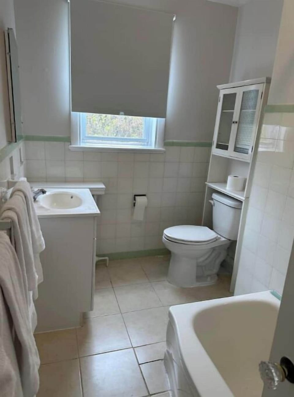 Full bathroom with bathtub/shower.