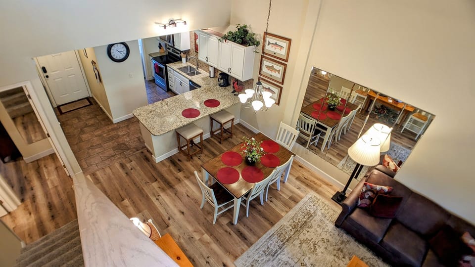 Dining and kitchen area view from loft