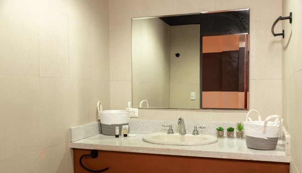 Refresh at the bright vanity with plenty of counter space.
