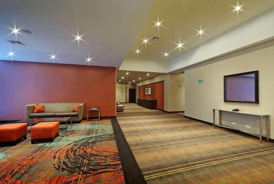 Stroll into a calm lounge area for relaxed conversations.