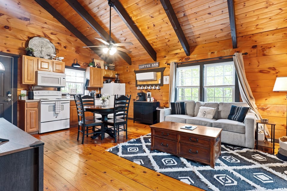 Settle into the wood-wrapped interior where every corner feels lived-in and warm - the kind of space that makes you exhale the second you walk in.