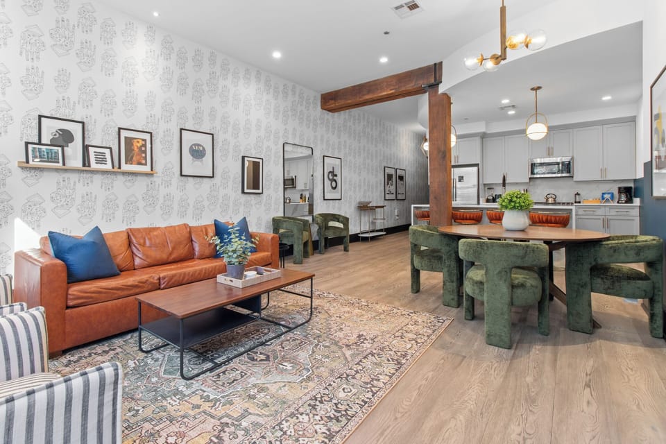 Relax in the living area with a smart TV, stylish seating and a sleeper sofa for extra guests. Perfect for families or group stays in New Orleans, this inviting space is ideal for movie nights or recharging after a day in the city.