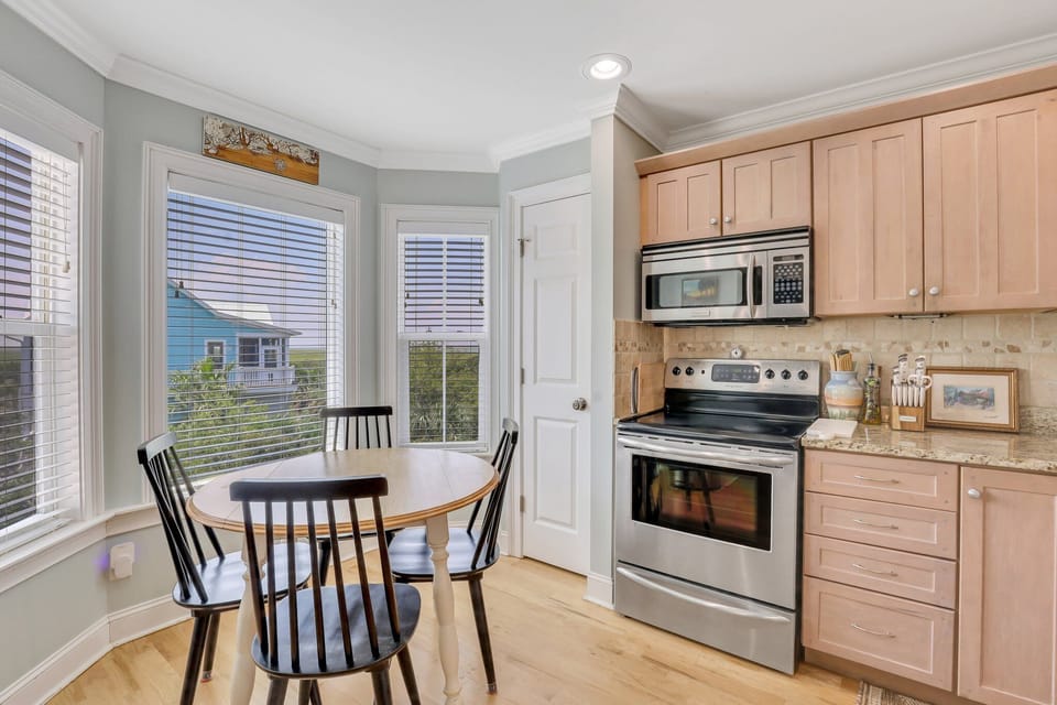 Fully stocked kitchen with sunset views.