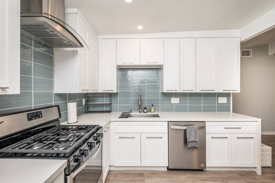 Fully stocked kitchen, including dishes, cooking supplies, spices, Keurig