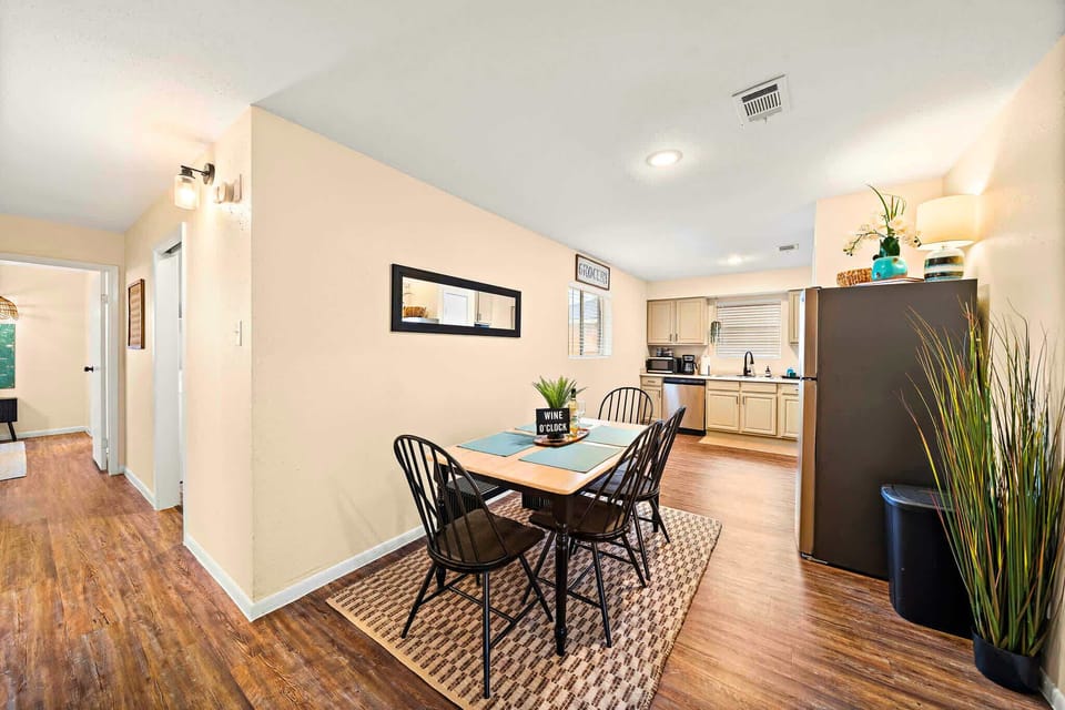 Dining Area: Gather around the stylish table for meals and memories in this bright, airy space!