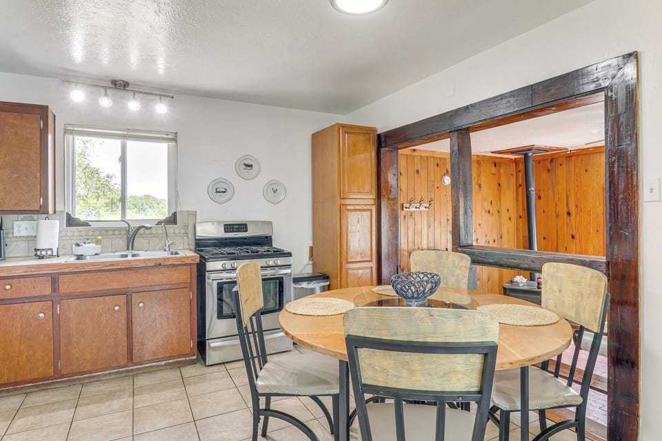 Dining Area | Dishware & Flatware Provided | Central A/C & Heat | 1st Floor