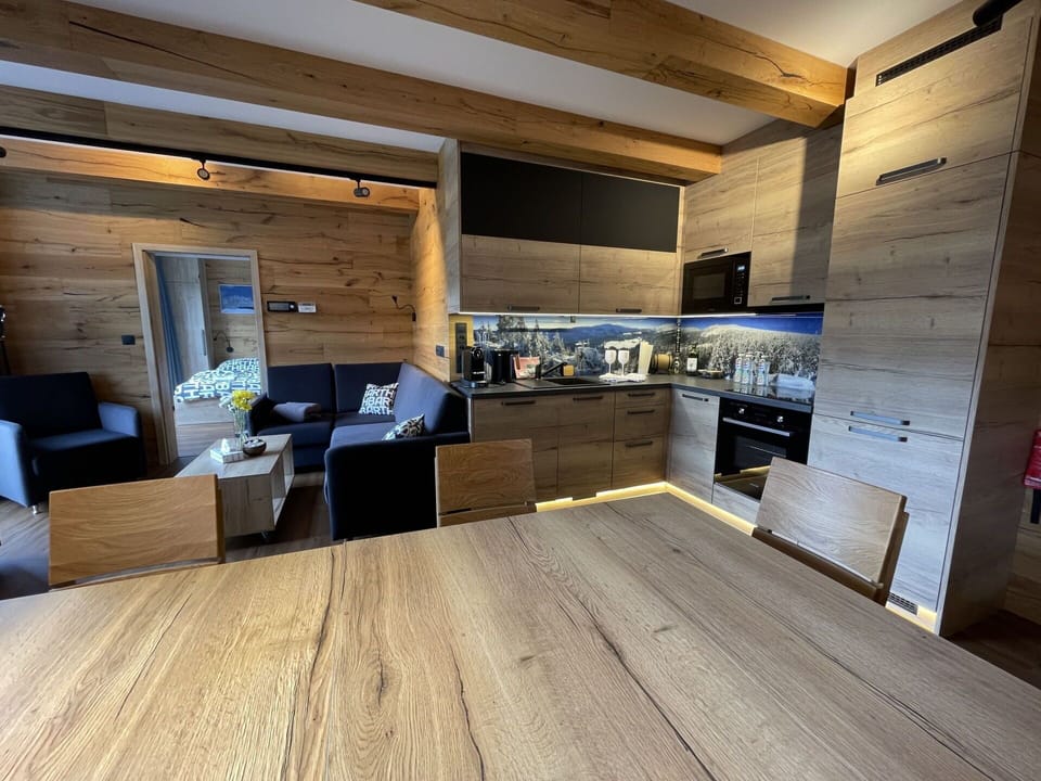 Wood, Chair, Flooring, Floor, Building, Couch, Hardwood, Table, Ceiling, Hall