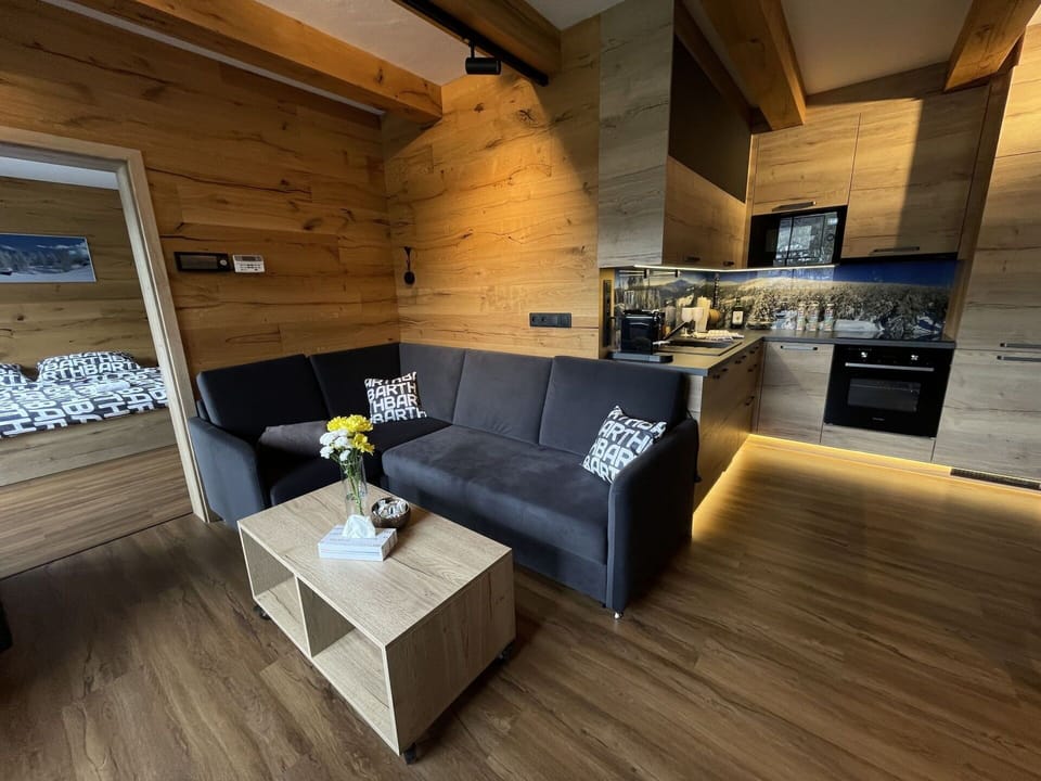 Property, Furniture, Couch, Wood, Interior Design, Comfort, Flooring, Floor, Pillow, Laminate Flooring