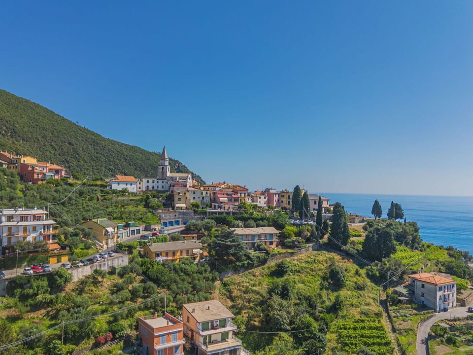 Sky, Building, Property, Azure, Plant, Water, House, Mountain, Tree, Urban Design
