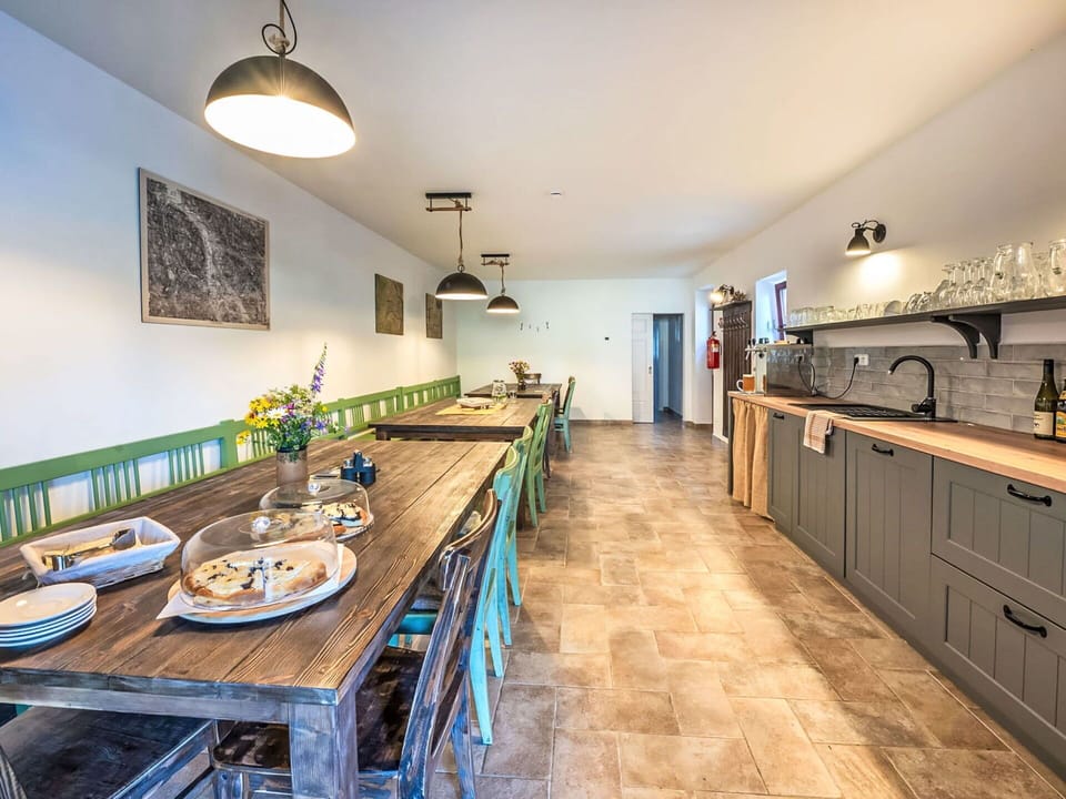 Furniture, Property, Cabinetry, Countertop, Table, Chair, Lighting, Couch, Kitchen, Interior Design