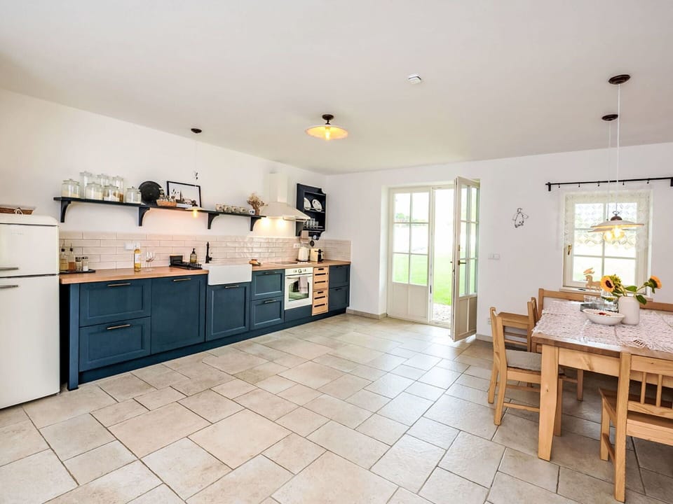 Cabinetry, Furniture, Countertop, Window, Wood, Picture Frame, Drawer, Lighting, Living Room, Building