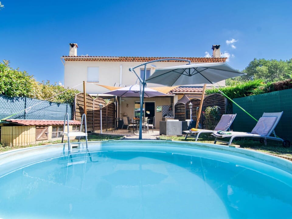 Water, Sky, Property, Plant, Swimming Pool, Azure, Shade, Outdoor Furniture, Building, Leisure