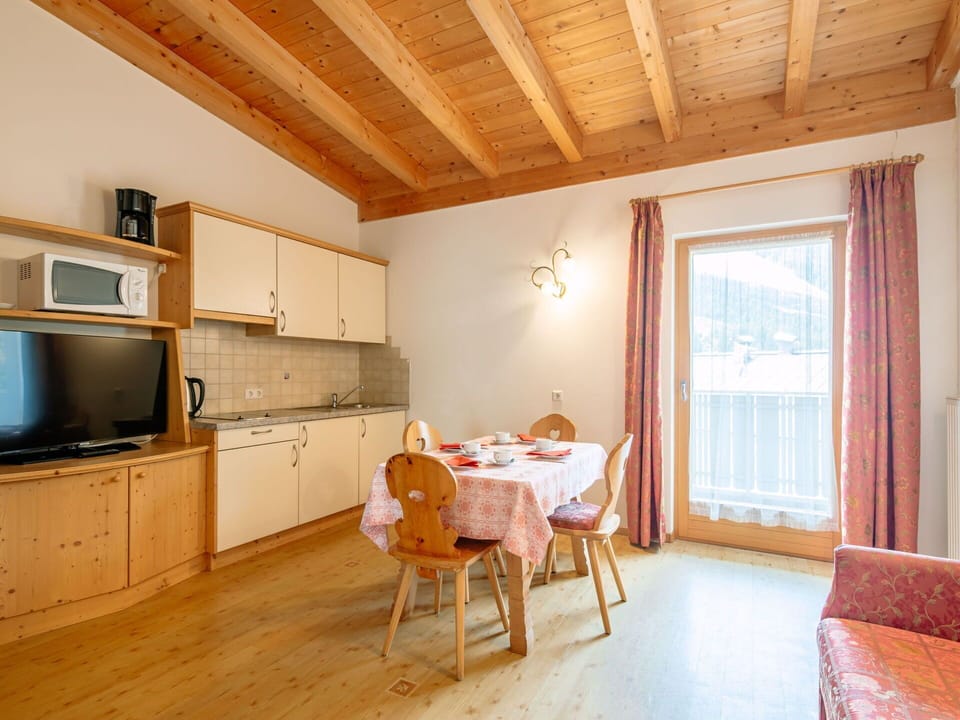 Cabinetry, Furniture, Property, Countertop, Building, Wood, Kitchen Appliance, Table, Chair, Flooring