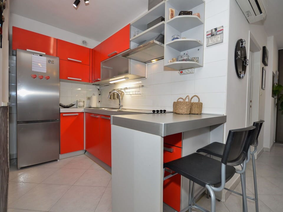 Building, Cabinetry, Countertop, Furniture, Kitchen, Kitchen Appliance, Home Appliance, Plant, Kitchen Stove, House
