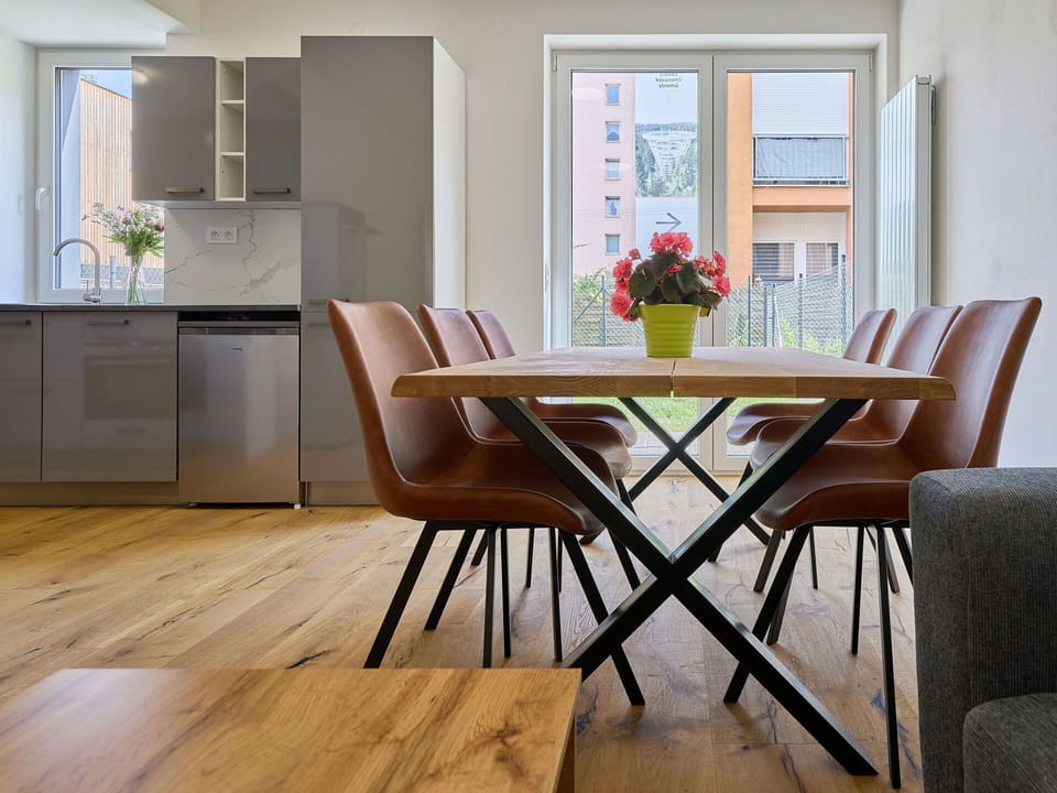 Furniture, Property, Cabinetry, Table, Countertop, Window, Chair, Wood, Lighting, Orange