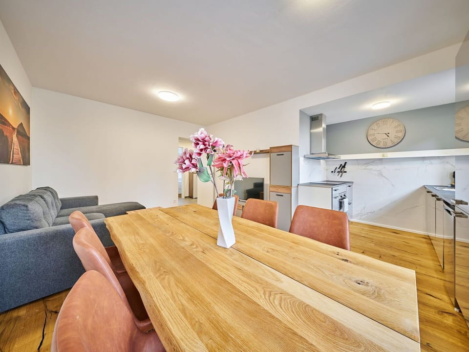 Furniture, Flower, Plant, Building, Couch, Table, Wood, Lighting, Interior Design, Flooring