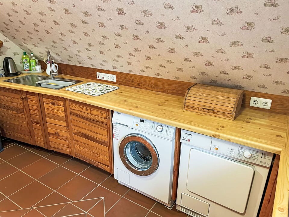 Laundry Room, Cabinetry, Property, Furniture, Countertop, Washing Machine, Wood, Clothes Dryer, Interior Design, Kitchen