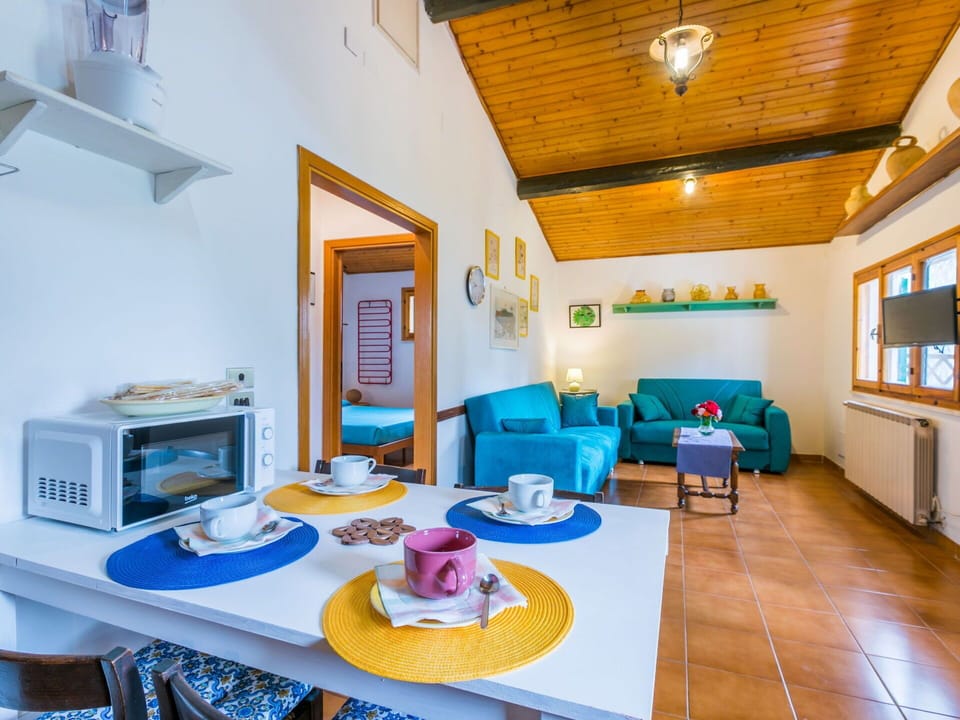 Furniture, Table, Property, Building, Orange, Interior Design, Picture Frame, House, Chair, Living Room