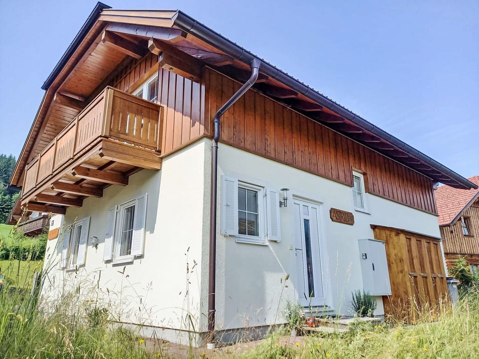 Plant, Sky, Window, Building, Wood, Land Lot, Grass, Roof, Facade