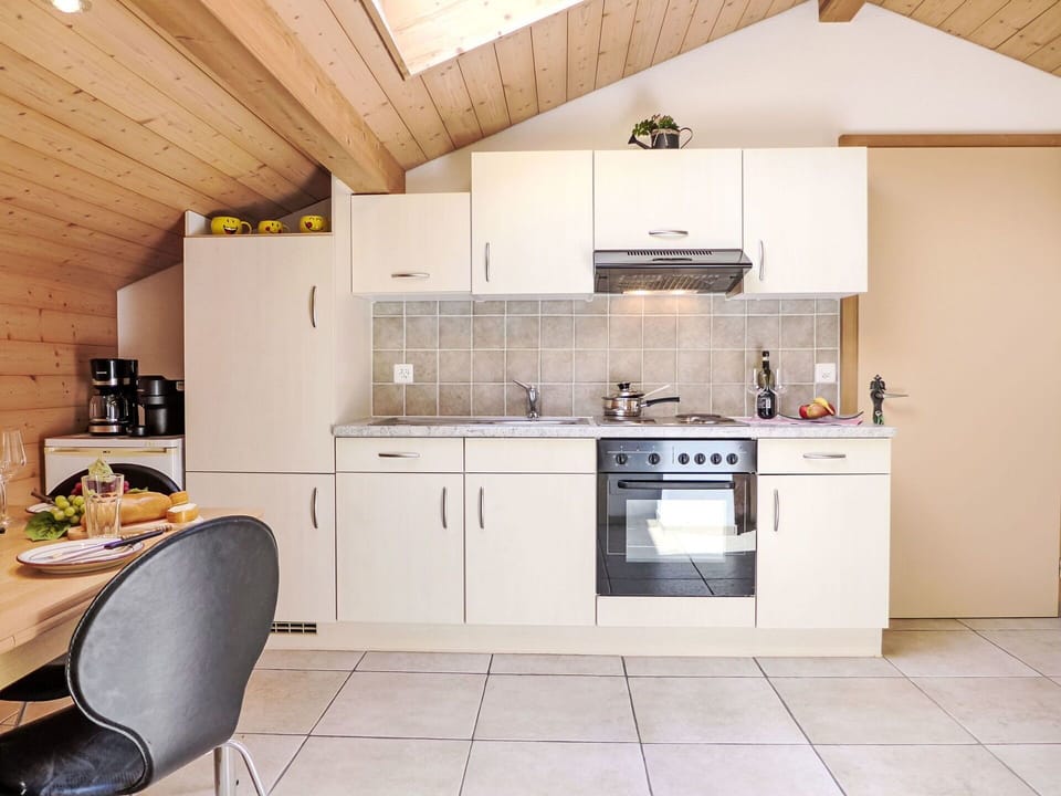 Cabinetry, Countertop, Property, Furniture, Kitchen, Kitchen Appliance, Sink, Kitchen Stove, Wood, Kitchen Sink