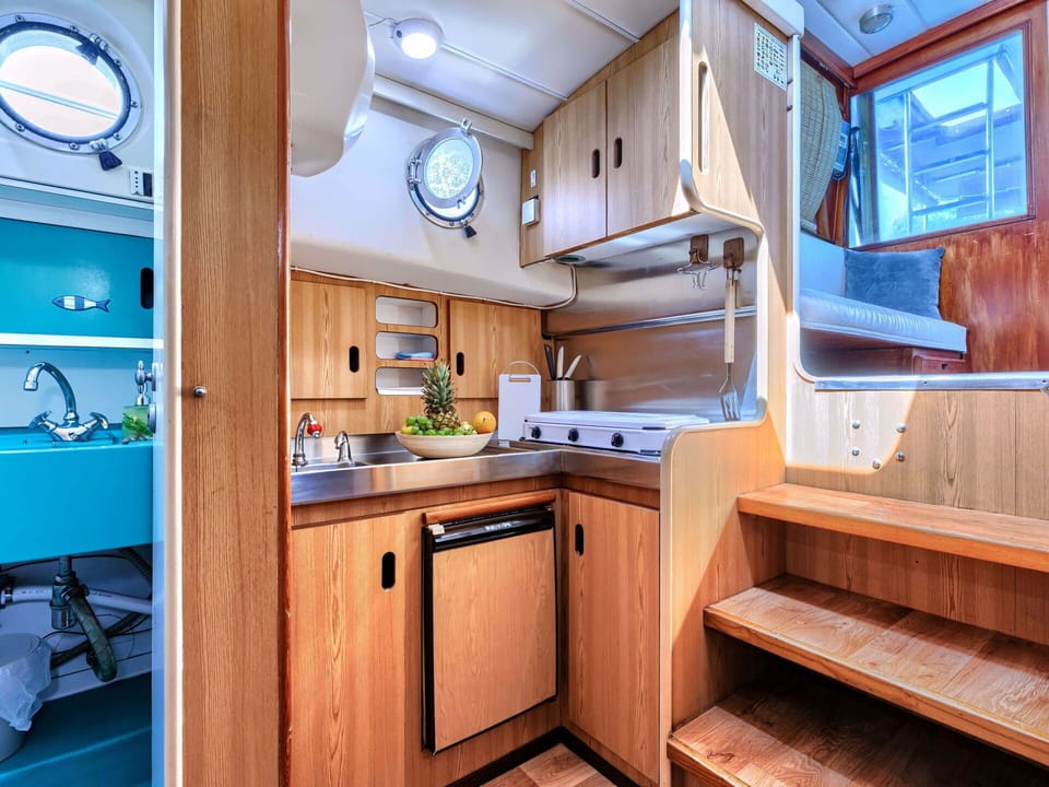 Cabinetry, Kitchen, Countertop, Wood, Kitchen Appliance, Interior Design, Sink, Floor, Flooring, Building