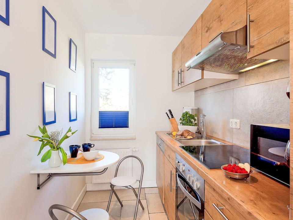 Property, Furniture, Table, Cabinetry, Window, Countertop, Plant, Wood, Interior Design, Sink