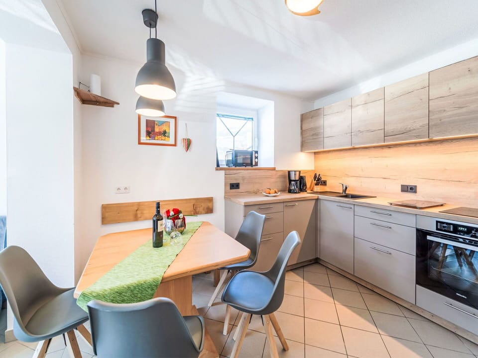 Furniture, Table, Property, Cabinetry, Countertop, Chair, Sink, Interior Design, Wood, Lighting