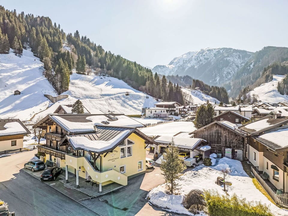 Sky, Snow, Mountain, Building, Tree, World, Slope, House, Cloud, Window