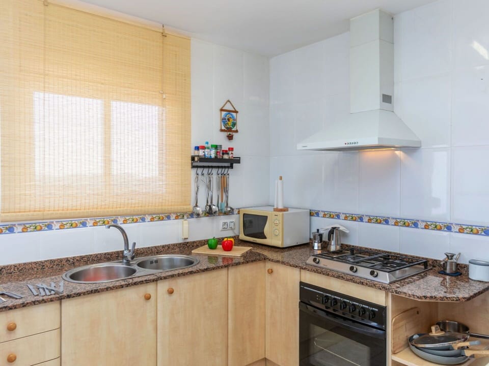 Kitchen, Countertop, Kitchen Appliance, Major Appliance, Interior Design, Flooring, Kitchen Sink, Floor, Cabinetry, Room