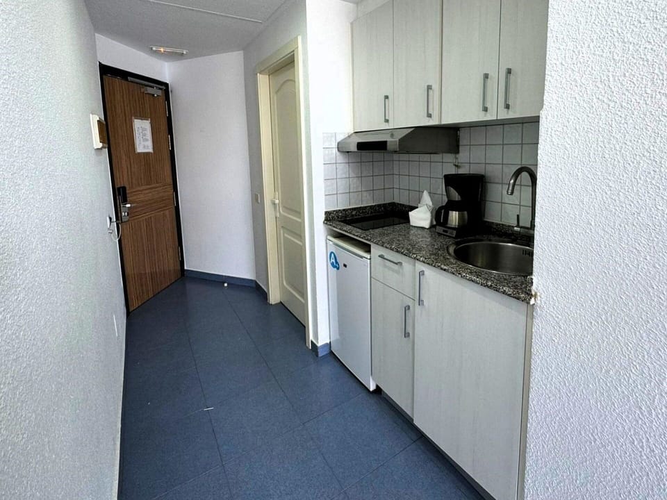Cabinetry, Sink, Kitchen Sink, Countertop, Kitchen, Interior Design, Kitchen Stove, Kitchen Appliance, Building, Floor