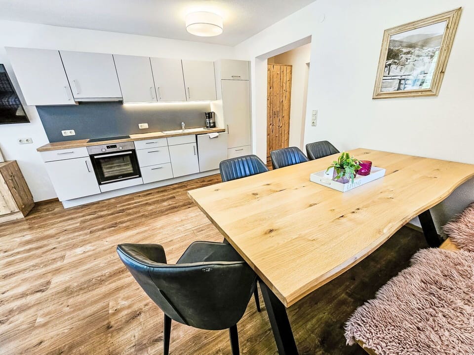 Furniture, Property, Cabinetry, Table, Chair, Countertop, Wood, Lighting, Interior Design, Floor
