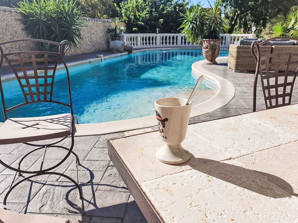 Water, Property, Plant, Swimming Pool, Azure, Outdoor Furniture, Architecture, Leisure, Flooring, Tree