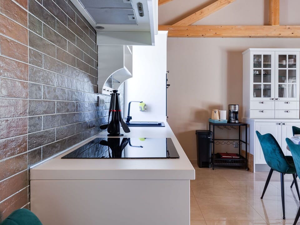 Furniture, Kitchen, Countertop, Kitchen Appliance, Cabinetry, Interior Design, Flooring, Wall, Major Appliance, Wood