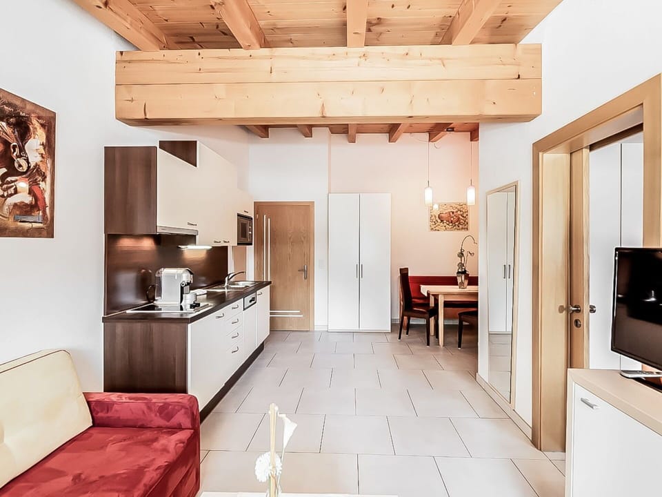 Furniture, Property, Cabinetry, Wood, Door, Television, Table, Drawer, Architecture, Interior Design