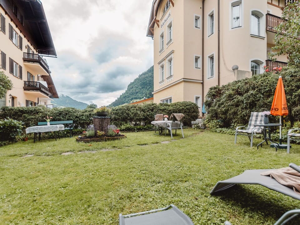 Plant, Building, Furniture, Sky, Cloud, Window, Urban Design, Grass, Leisure, Tree