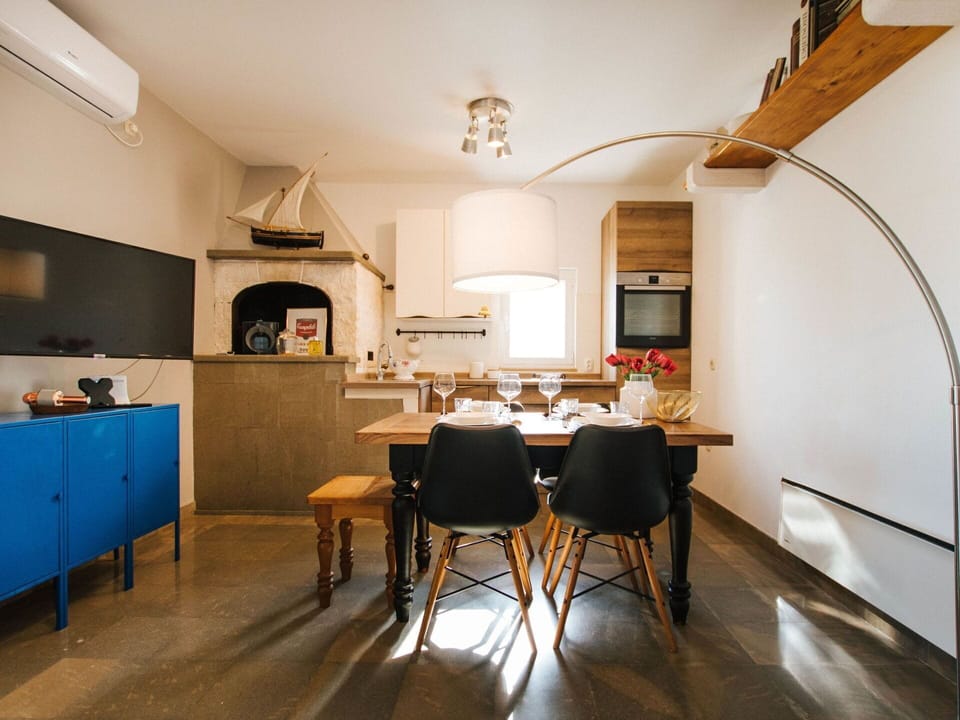 Sky, Property, Furniture, Table, Azure, Chair, Building, Window, Shade, Architecture