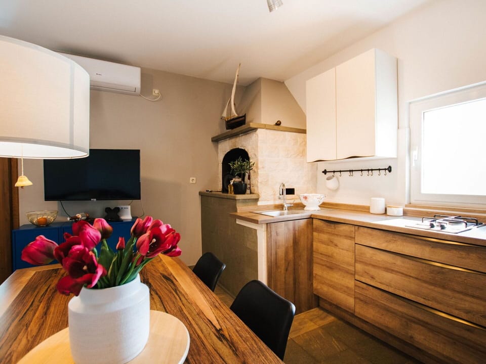 Sky, Property, Furniture, Table, Azure, Chair, Building, Window, Shade, Architecture