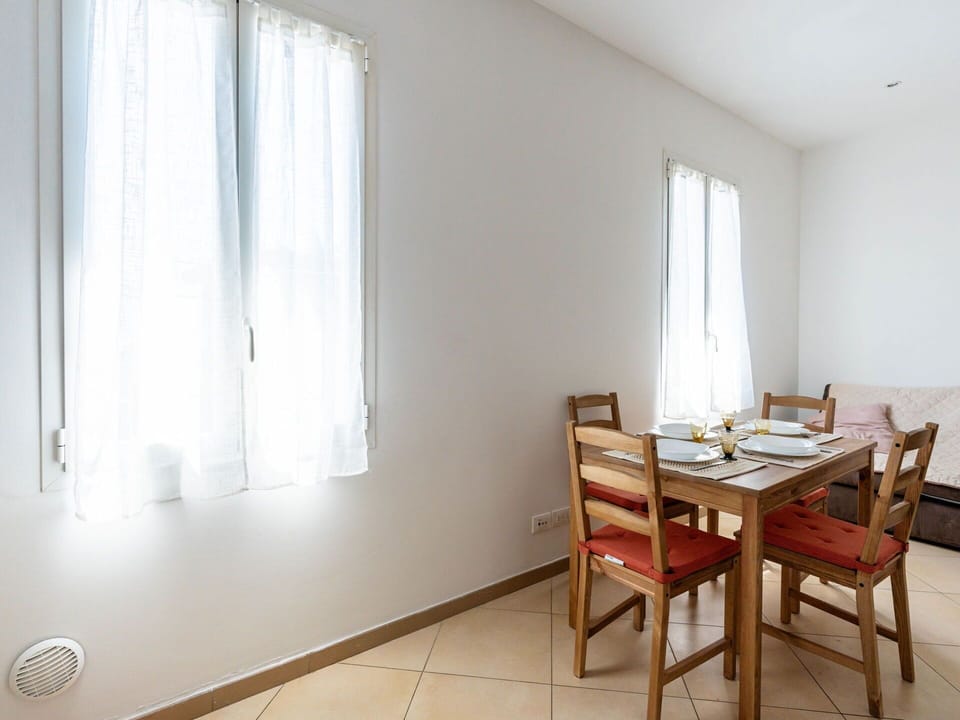 Sky, Property, Furniture, Table, Azure, Chair, Building, Window, Shade, Architecture