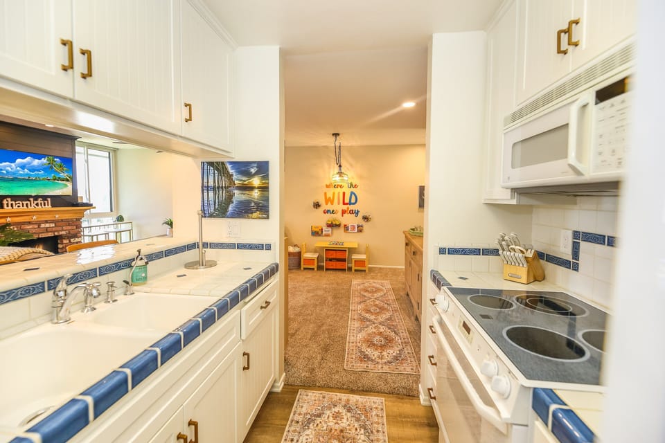 High quality tile counters with plenty of kitchen cabinets